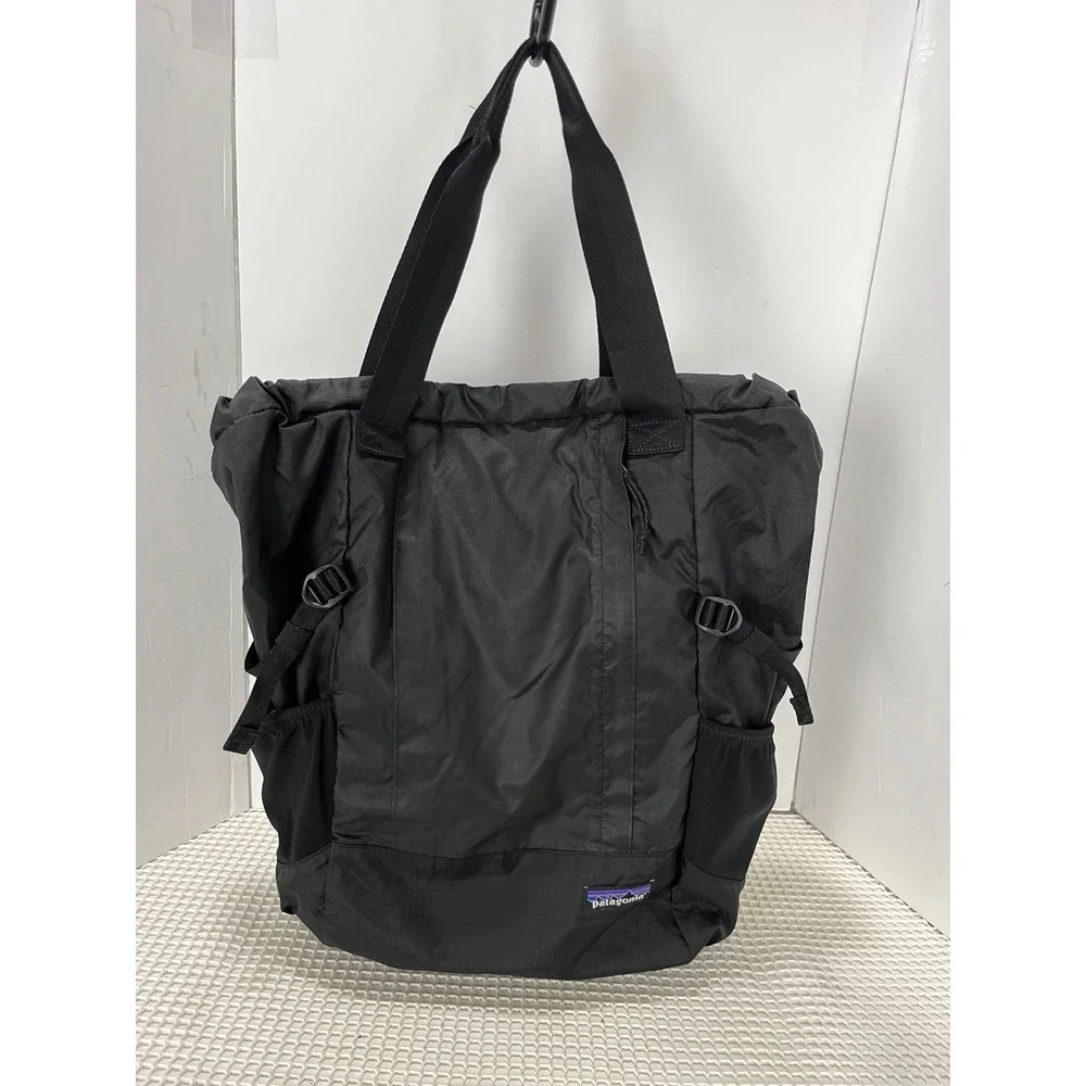 patagonia tote bag black Hole 25L with a black colorway that resists stains and fading Patagonia Black Hole Tote 25L